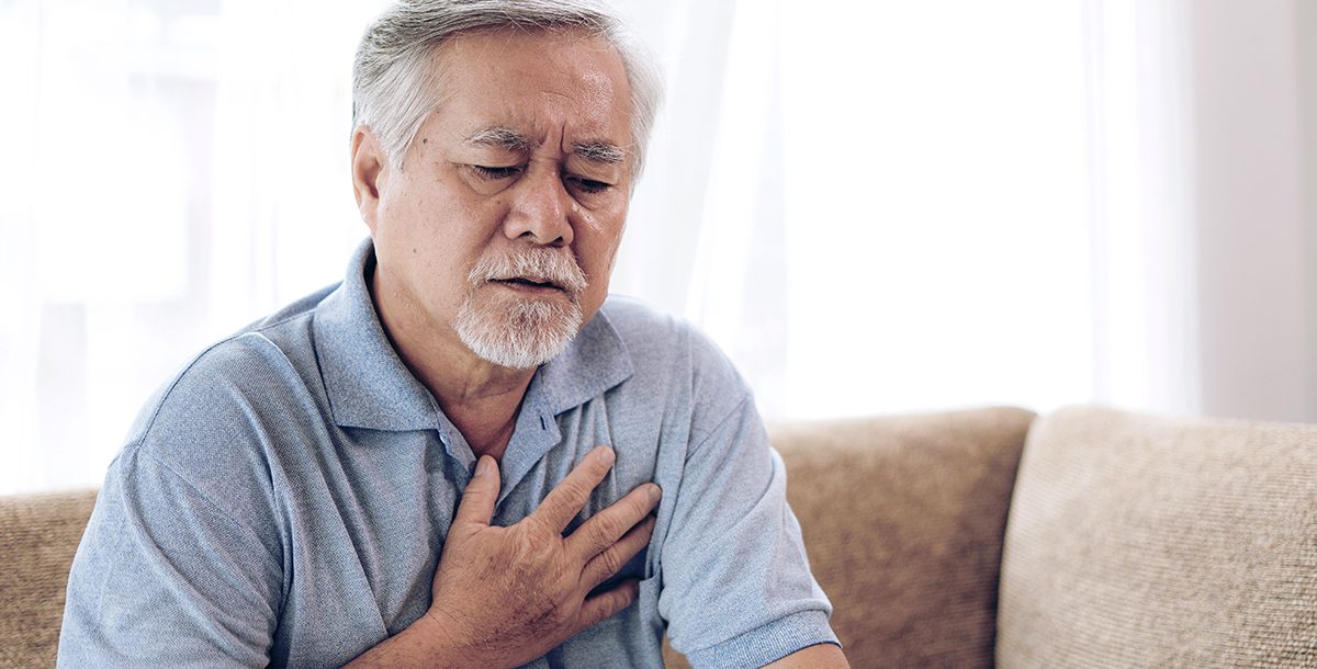 A man experiencing symptoms of a heart attack.