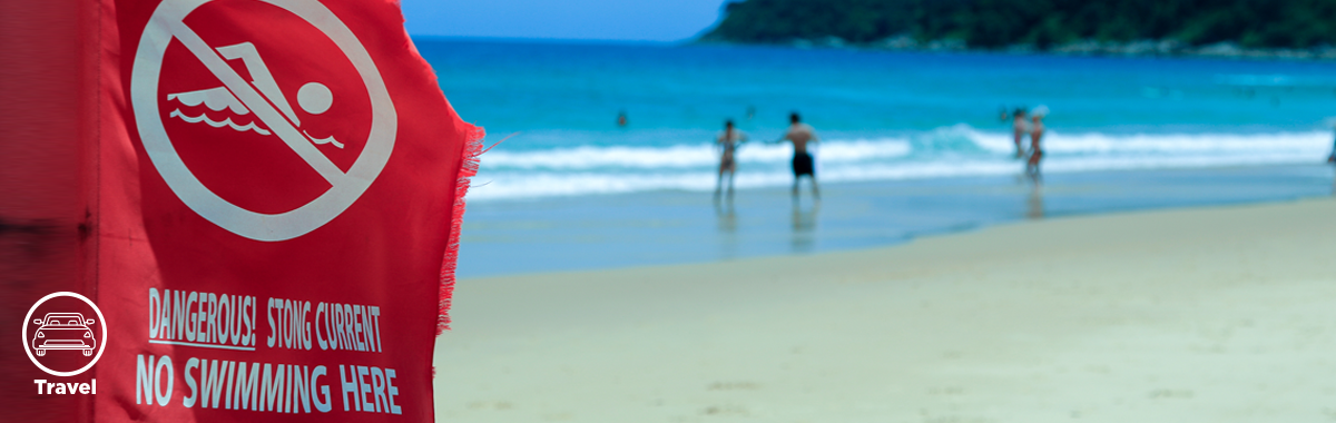 safety flag on a beach _ safety tips for different destination types