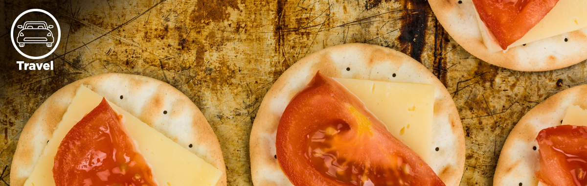 tomato and cheese on a cracker _ healthy road trip snacks