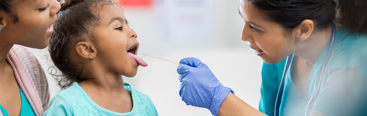 physician tests female child for strep throat