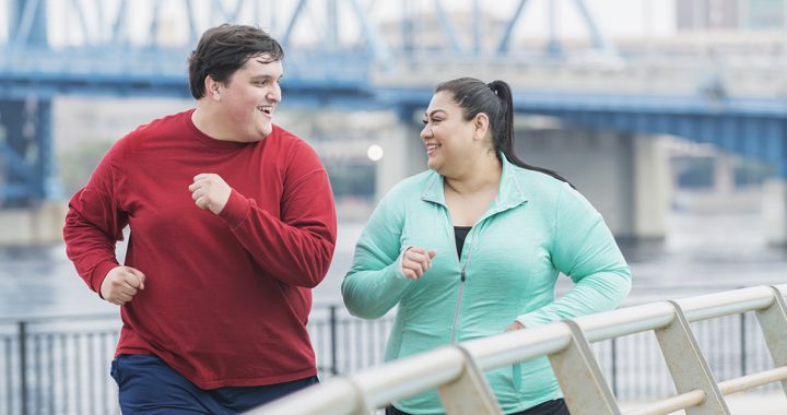 Two people staying active to boost their metabolism.