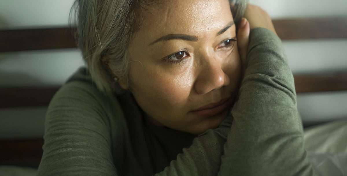 A woman experiencing signs of suicide.