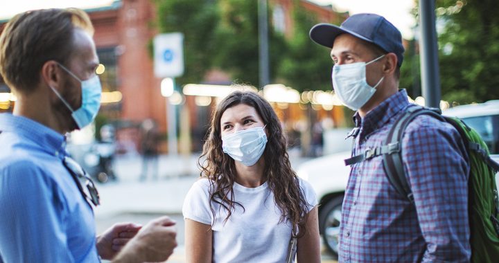 People wearing face masks while in public.