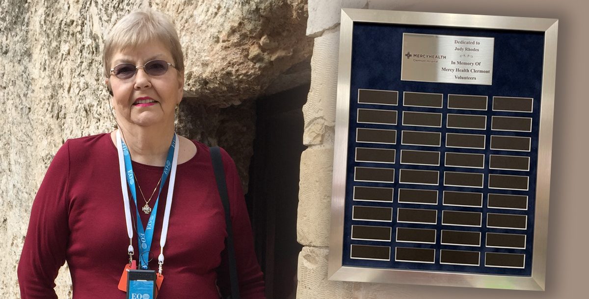Judy Rhodes and our new volunteer plaque
