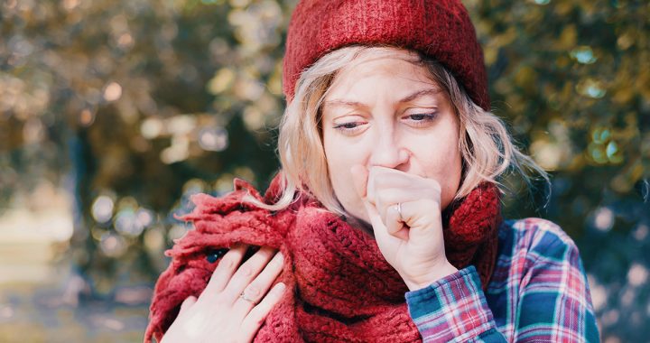 A woman bundled up during the fall season