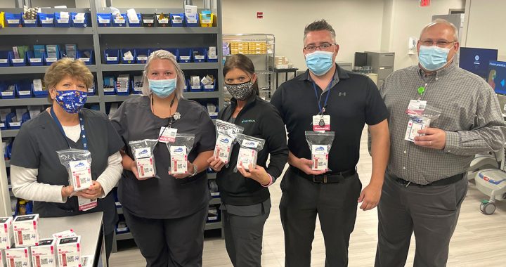 Lourdes Hospital team members with Narcan packets