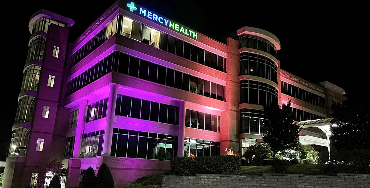 Purple light shining on the Marshall Nemer Medical Office building.