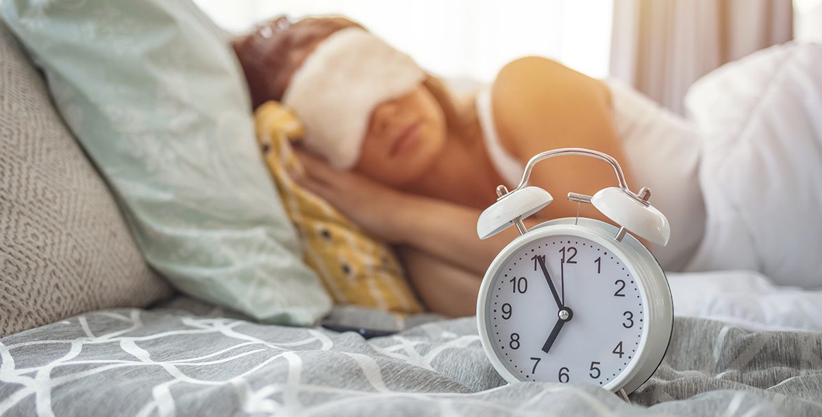 A woman sleeping during daylight saving time.
