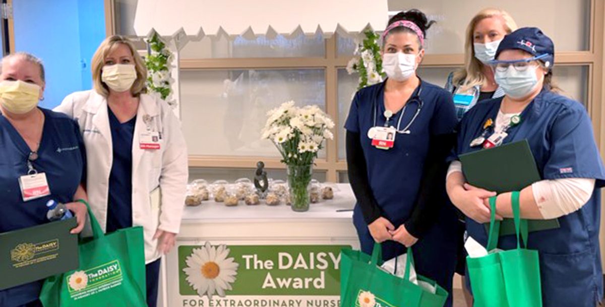 The four nurse daisy award winners.