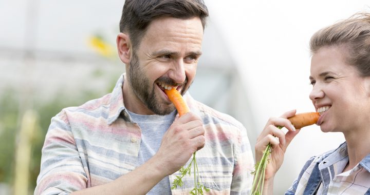 a person eating carrots
